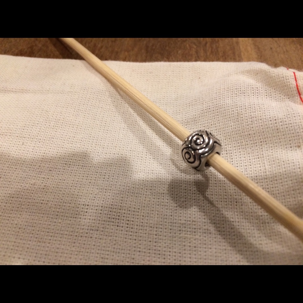 Pandora swirl charm